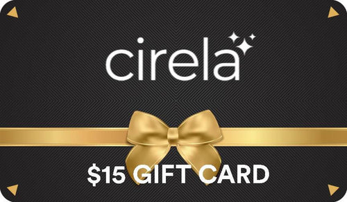 A $15 Cirela Beauty Gift Card features “cirela” with sparkles above a gold ribbon and bow, plus 