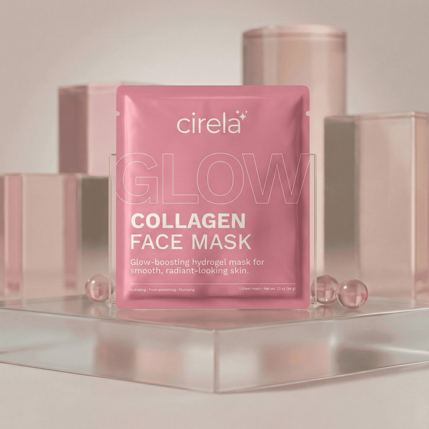 A pink Cirela Collagen Face Mask package stands upright amid translucent pink and clear geometric blocks, with the word GLOW in large letters across the image. The background and setting are soft and pastel.