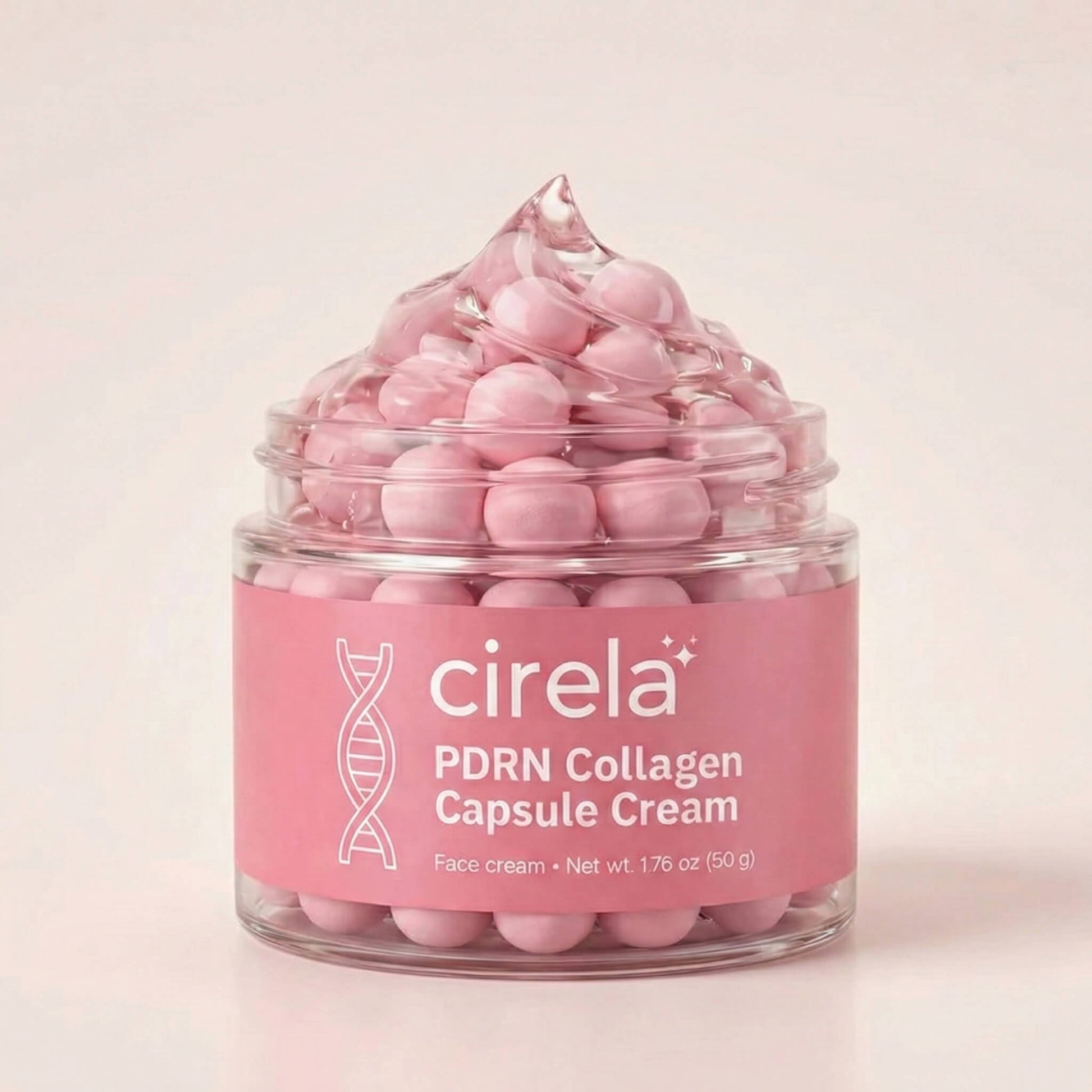 A clear jar labeled "PDRN Collagen Capsule Cream" from Cirela Beauty displays pink capsules topped with a swirl of cream, set against a light pink background and promising deeply hydrated skin.