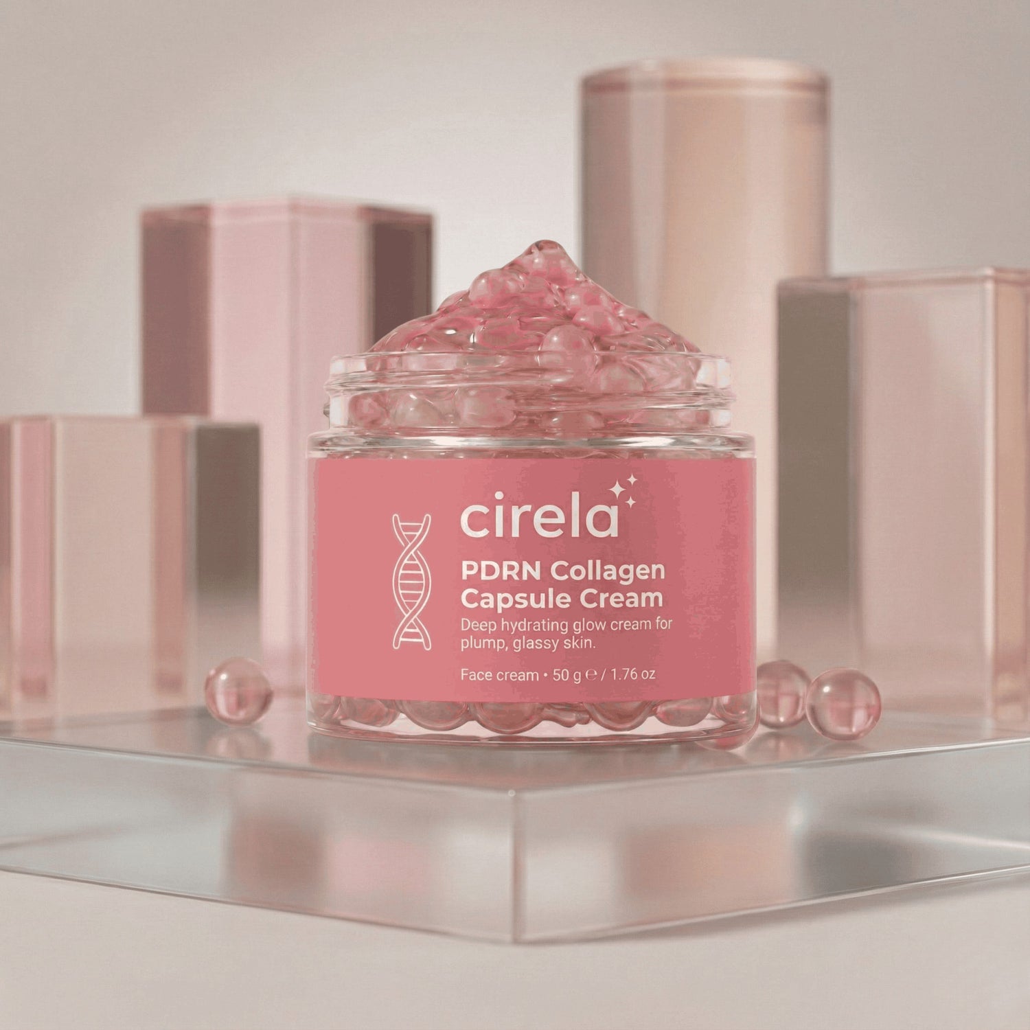 A jar labeled cirela PDRN Collagen Capsule Cream filled with pink capsule beads is displayed on a clear platform, surrounded by translucent pink and neutral blocks in a soft-toned setting.