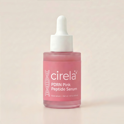A pink bottle of Cirela Beauty PDRN Pink Peptide Serum with a white dropper cap, labeled for face use, delivers lightweight hydration and is set against a light, neutral background.