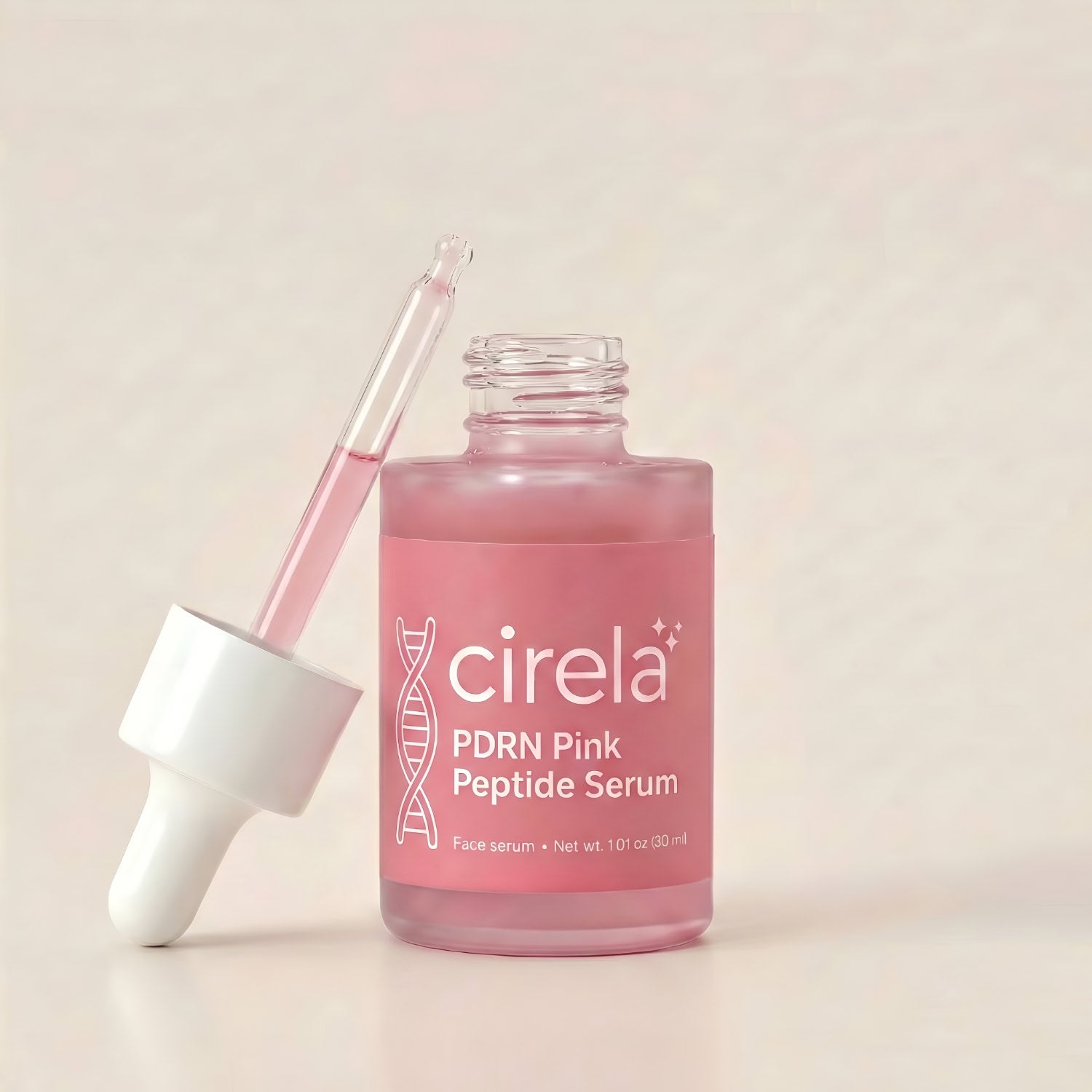 An open bottle of Cirela Beauty PDRN Pink Peptide Serum with a dropper and pink liquid stands against a light background. Its white label displays the brand name and highlights its hydrating peptide serum formula.