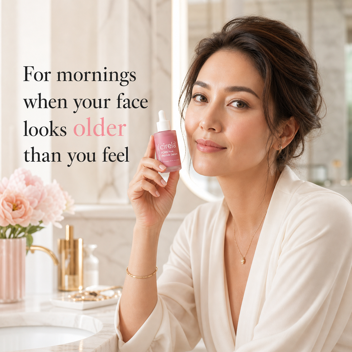 A woman in a white robe sits in a bright bathroom holding Cirela Beauty’s PDRN Pink Peptide Serum. Text reads, “For mornings when your face looks older than you feel.” Pink flowers and gold decor give the counter a glow boost vibe.